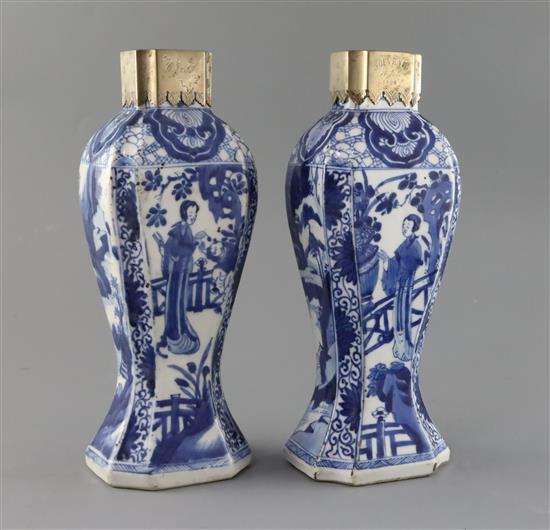 A pair of Chinese blue and white canted rectangular baluster vases, Kangxi period, H.26.7cm, one neck with section lacking obscured by